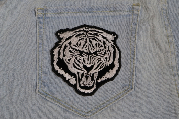 Small White Baron Tiger Iron on Patch shown on jeans