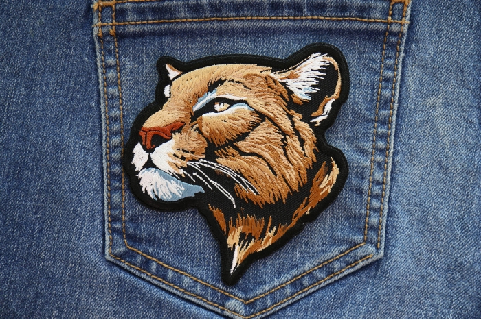 Thinking Mountain Lion Patch shown on jeans