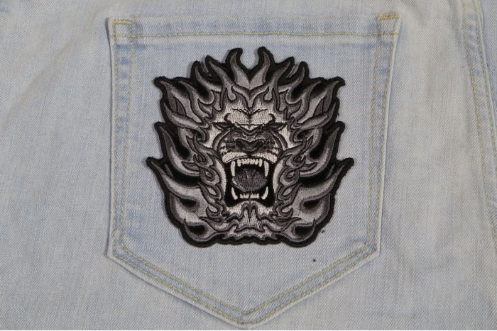 Tribal Lion Small Iron on Patch shown on jeans