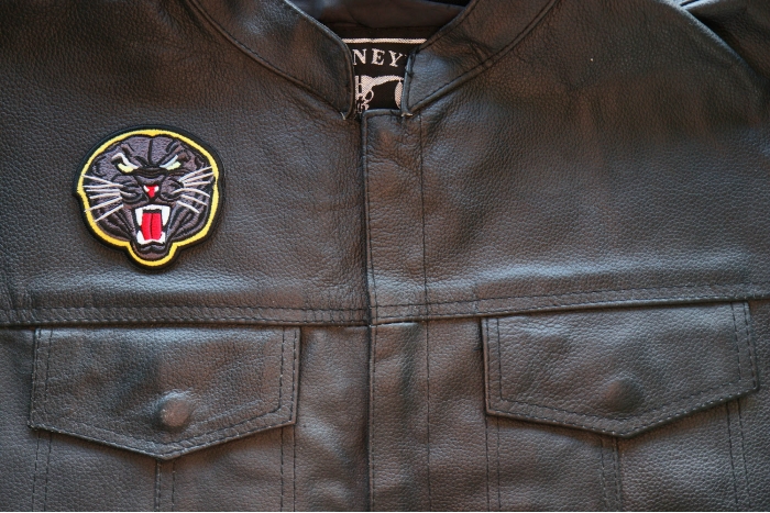 Black Jaguar Iron on Patch shown on leather vest