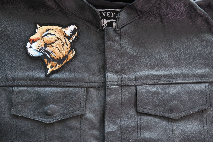 Thinking Mountain Lion Patch shown on leather vest