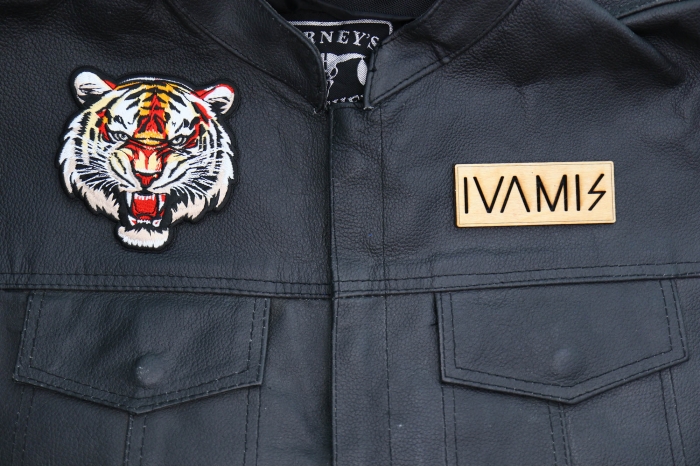 Tiger Snaring Patch shown on leather vest
