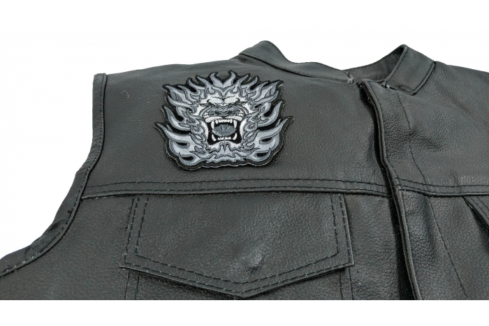 Tribal Lion Small Patch - 4x4 inch. Embroidered Iron on Patch shown on leather vest