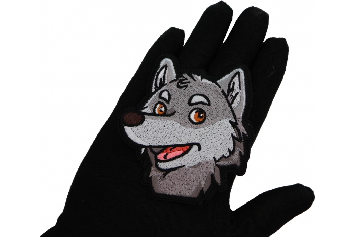 Cartoon Wolf Patch shown on hand for size comparison