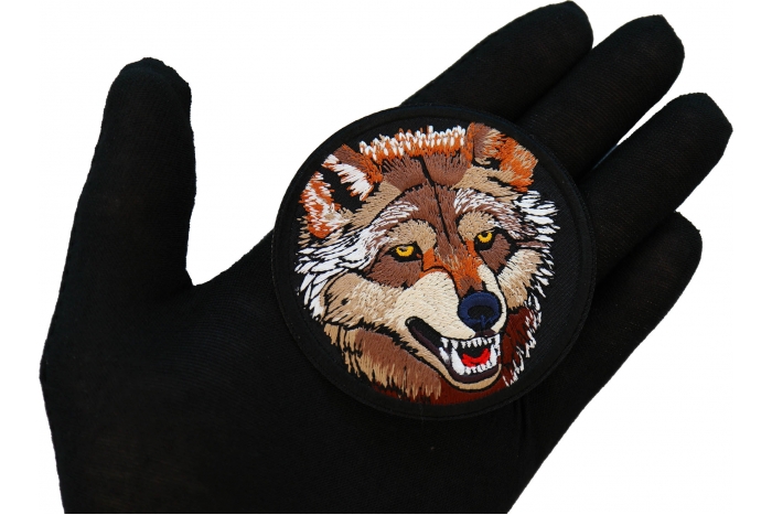 Pretty Wolf Patch shown on hand for size comparison