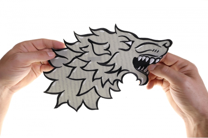 Stark Wolf Patch, Large Animal Patches for Jackets shown on hand for size comparison
