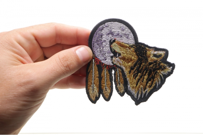 Wolf Moon Small Patch shown on hand for size comparison