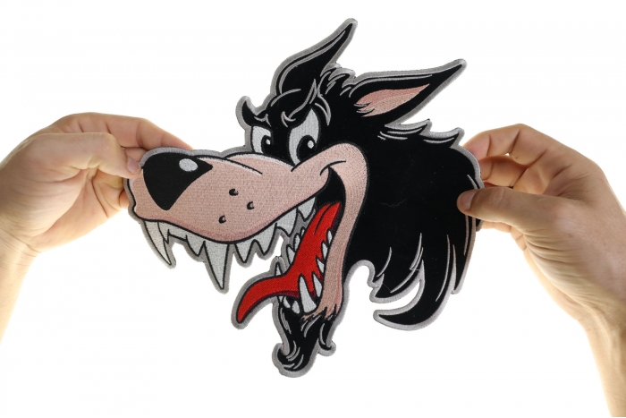 Wolf Patch, Large Animal Patches for Jackets shown on hand for size comparison