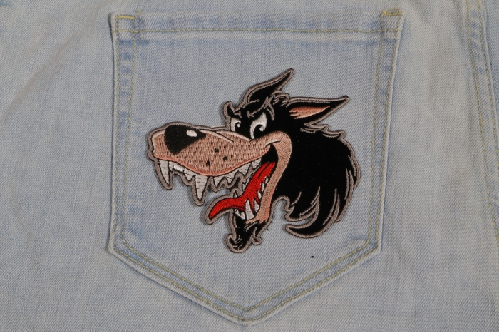 Small Cartoon Wolf Patch shown on jeans