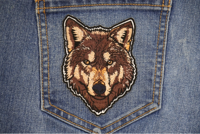 Staring Wolf Patch shown on jeans