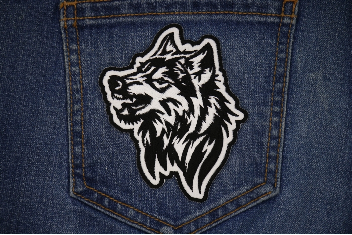 Tribal Wolf Snaring Patch shown on jeans