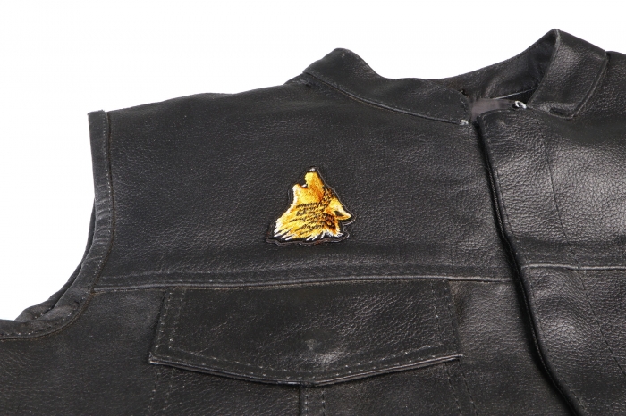 Mini Wolf Head Patch - 1.5 inch. Embroidered Iron on Patch shown on leather vest