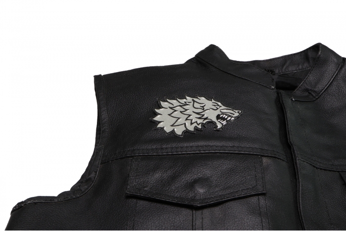 Sideways Wolf Patch - 4x2.6 inch - Embroidered Iron on Patch shown on leather vest