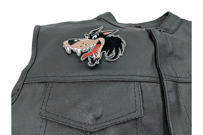 Small Cartoon Wolf Patch - 4x4 inch. Embroidered Iron on Patch shown on leather vest