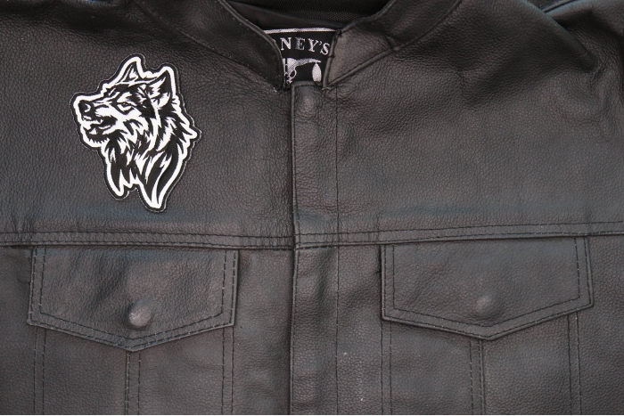 Tribal Wolf Snaring Patch shown on leather vest