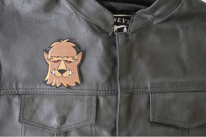 Wacky Wolf Patch - 2.9x3.5 inch - Embroidered Iron on Patch shown on leather vest