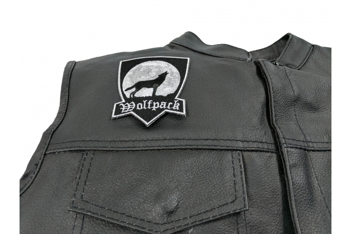 Wolfpack Patch With Howling Wolf - 3x4 inch. Embroidered Iron on Patch shown on leather vest
