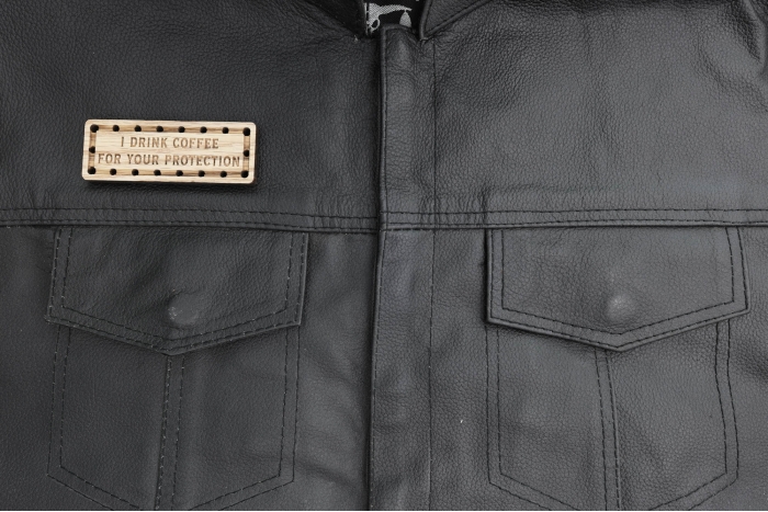 I Drink Coffee for your Protection Oak Wood Patch shown on leather vest
