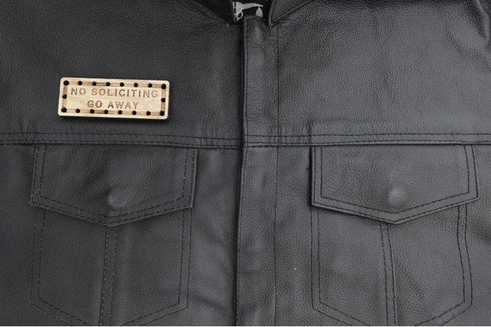 No Soliciting Go Away Oak Wood Patch shown on leather vest