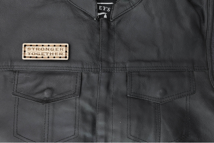 Stronger Together Wood Oak Patch shown on leather vest