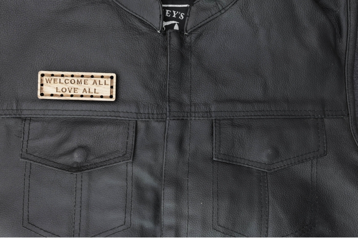 Welcome All Love All Wood Oak Patch shown on leather vest