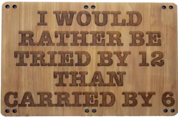 I would rather be tried by 12 than carried by 6 wood sign