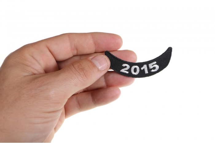 2015 White Lower Rocker Patch shown on hand for size comparison