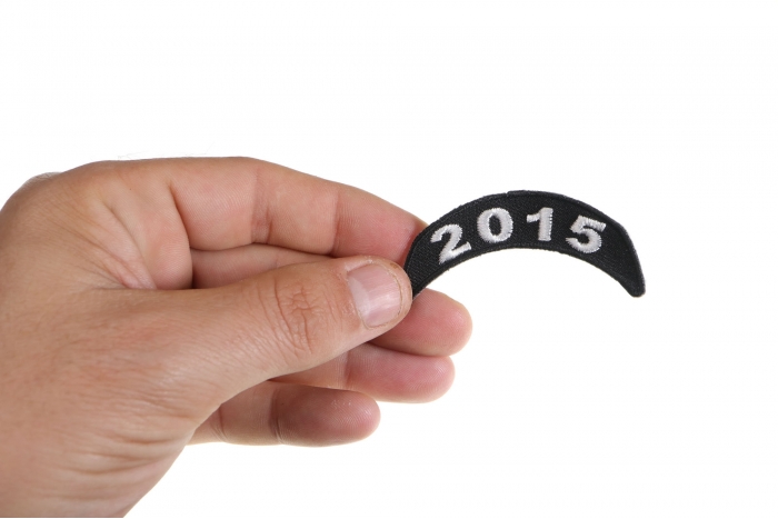 2015 White Upper Rocker Patch shown on hand for size comparison