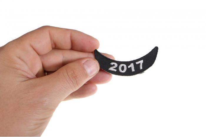  shown on hand for size comparison