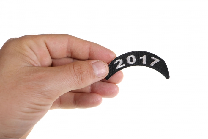 2017 White Upper Rocker Patch shown on hand for size comparison