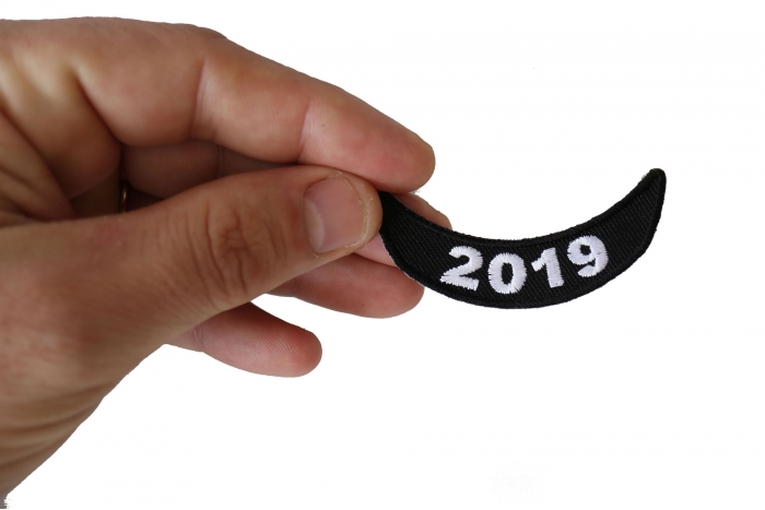 2019 Lower Rocker Patch shown on hand for size comparison