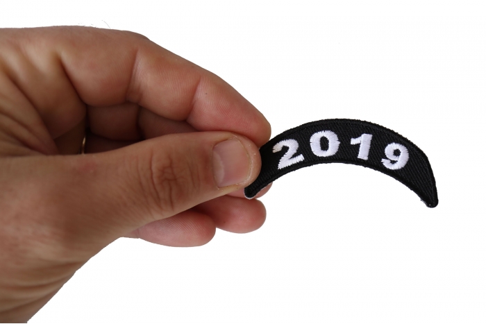 2019 Upper Rocker Patch shown on hand for size comparison