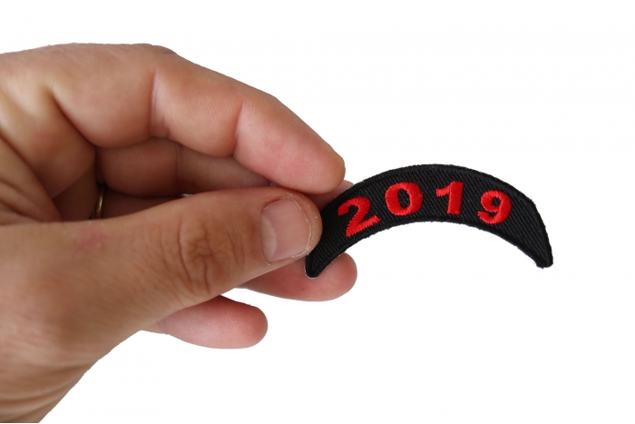 2019 Upper Rocker Red Patch shown on hand for size comparison