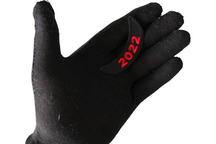 2022 Red Lower Rocker Year Patch shown on hand for size comparison