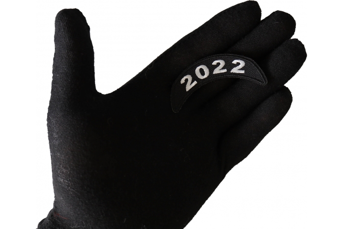 2022 Upper Rocker Patch shown on hand for size comparison