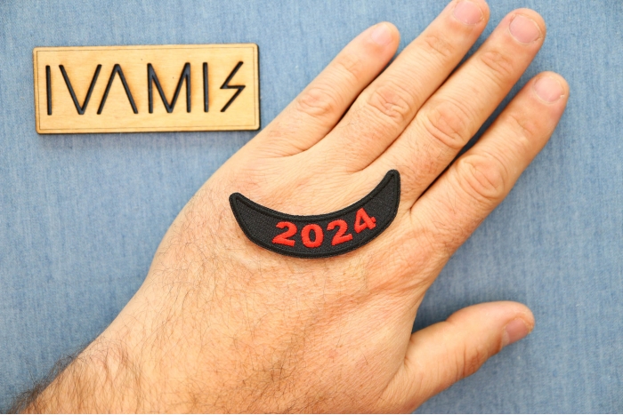 2024 Patch Lower Rocker Red shown on hand for size comparison