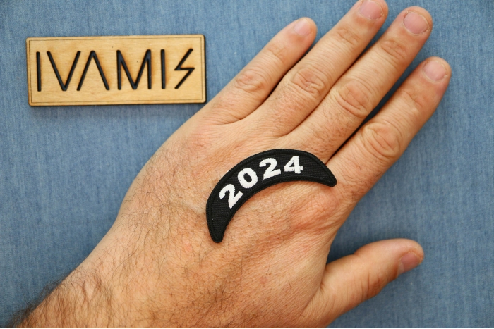 2024 Patch Upper Rocker White shown on hand for size comparison