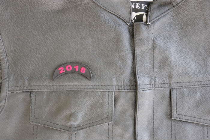 2018 Black and Red Rocker Patch - 2.5x1 inch. Embroidered Iron on Patch shown on leather vest