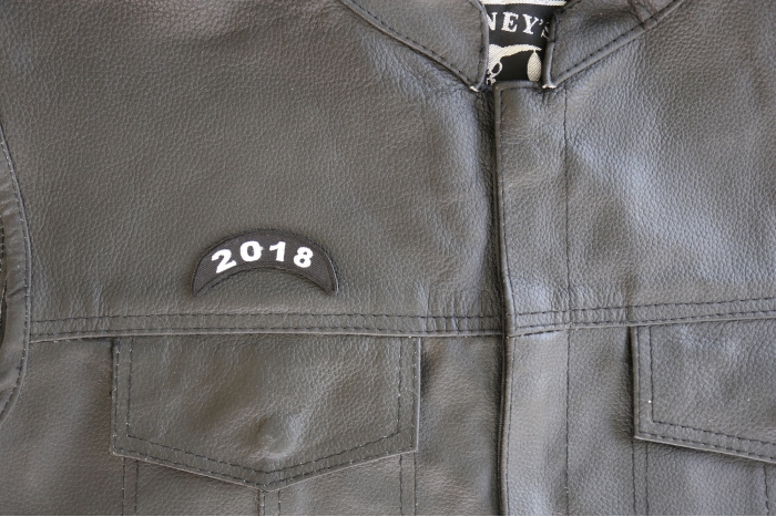 2018 Black and White Rocker Patch - 2.5x1 inch. Embroidered Iron on Patch shown on leather vest