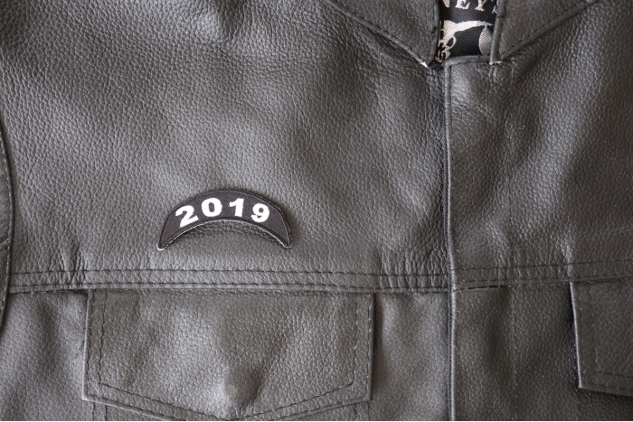 2019 Upper Rocker Patch - 2.5x1 inch - Embroidered Iron on Patch shown on leather vest