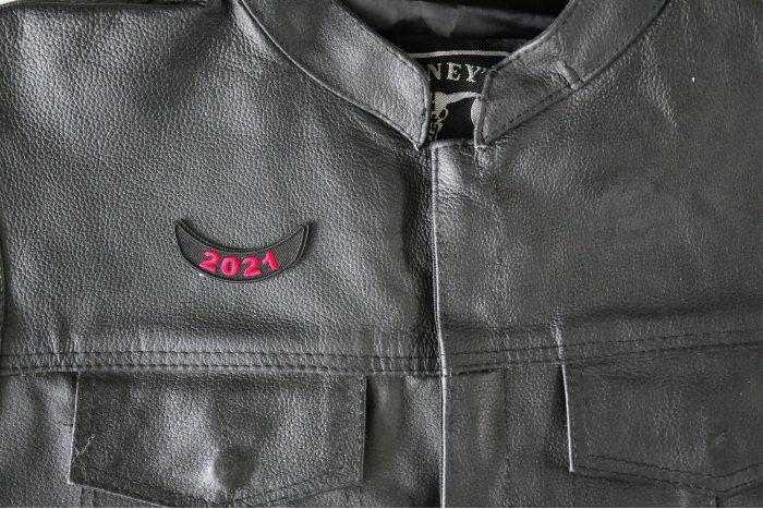 2021 Year Rocker Patch Lower Red - 2.5x1 inch - Embroidered Iron on Patch shown on leather vest