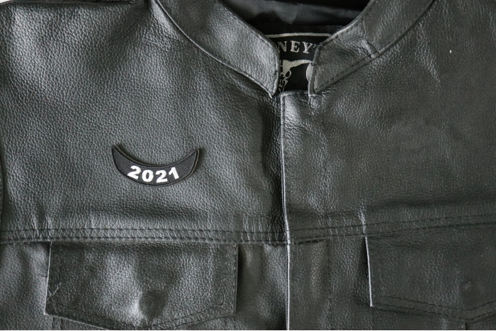 2021 Year Rocker Patch Lower White - 2.5x1 inch - Embroidered Iron on Patch shown on leather vest