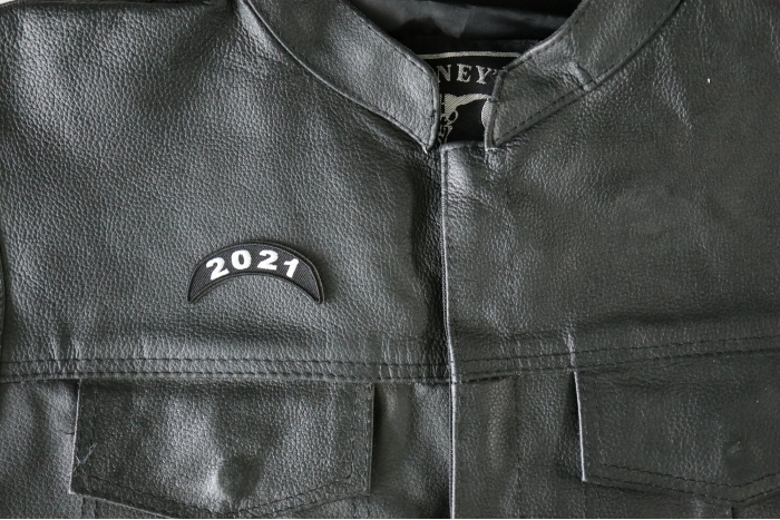 2021 Year Rocker Patch Upper White - 2.5x1 inch - Embroidered Iron on Patch shown on leather vest