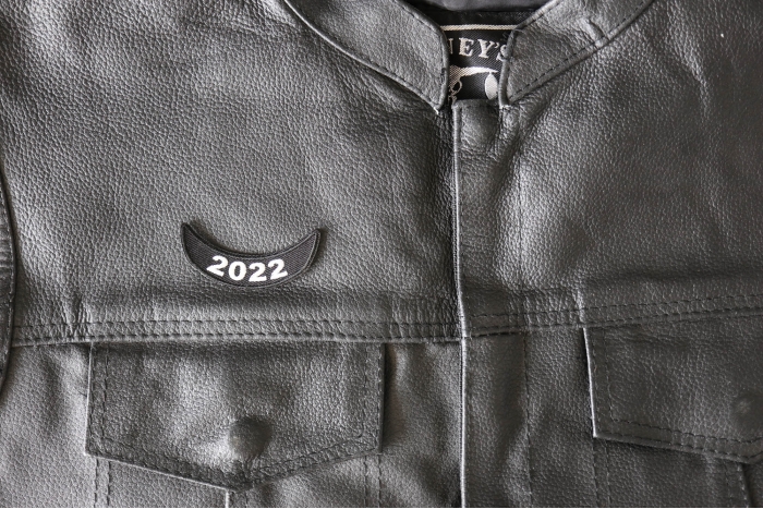 2022 Lower Rocker Patch - 2.5x1 inch - Embroidered Iron on Patch shown on leather vest