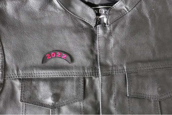 2022 Red Upper Rocker Year Patch - 2.5x1 inch - Embroidered Iron on Patch shown on leather vest