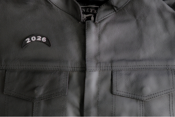 2026 Upper Rocker White Year Patch shown on leather vest
