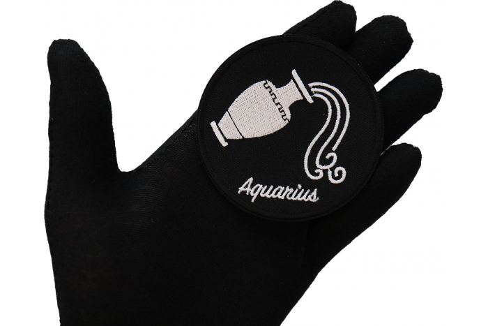 Aquarius zodiac sign Patch shown on hand for size comparison