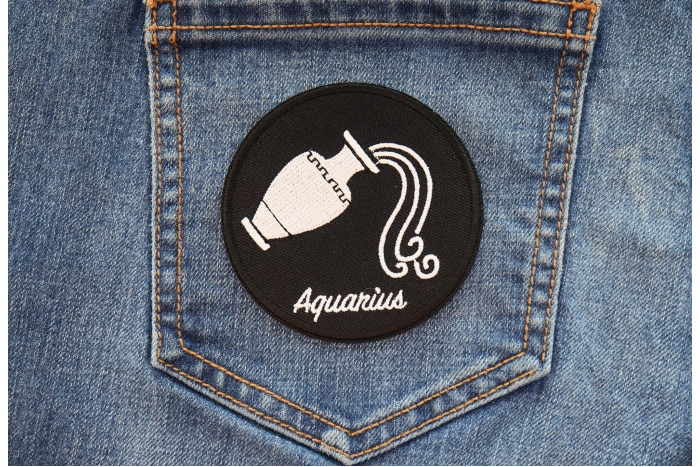 Aquarius Zodiac Patch shown on jeans