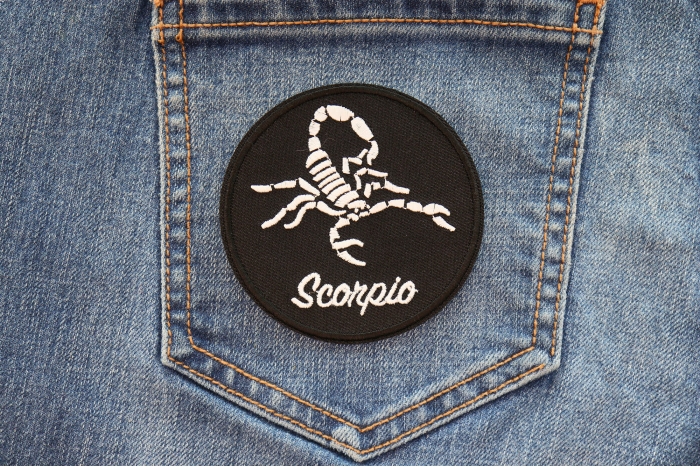 Scorpio Zodiac Patch shown on jeans