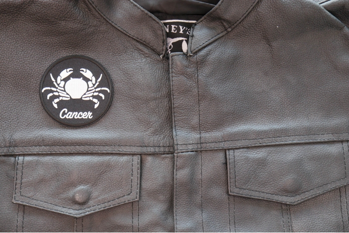Cancer Patch - Iron on - Embroidered shown on leather vest
